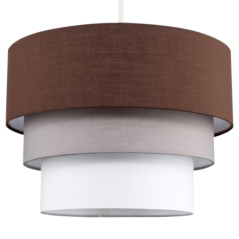 Three-tiered fabric ceiling pendant light featuring a brown outer shade, a grey middle shade, and a white inner shade, all with a smooth finish.