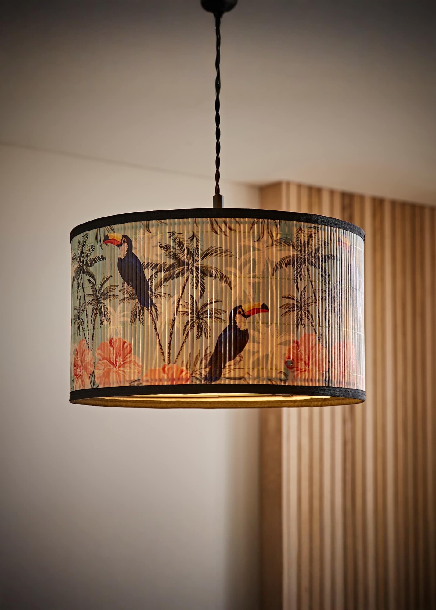 Medium drum ceiling lamp shade featuring a pastel jungle design with toucans and tropical plants, made of bamboo and showcasing a natural finish.