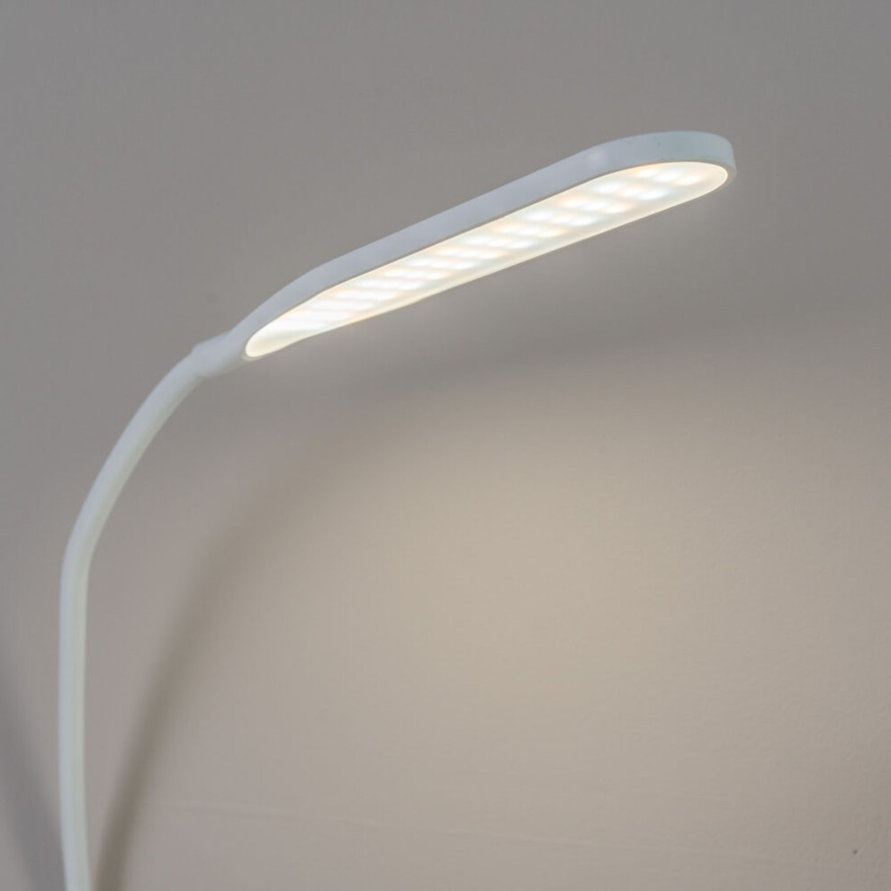White LED desk lamp with a sleek, adjustable arm and a clamp for attachment, featuring a slim, elongated light panel that emits daylight-like brightness.