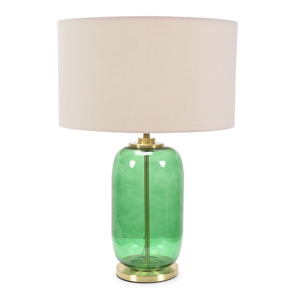 Leigh fabric drum shade table lamp features a nude shade, a forest green glass base, and gold trim, complemented by an LED bulb for a stylish touch.