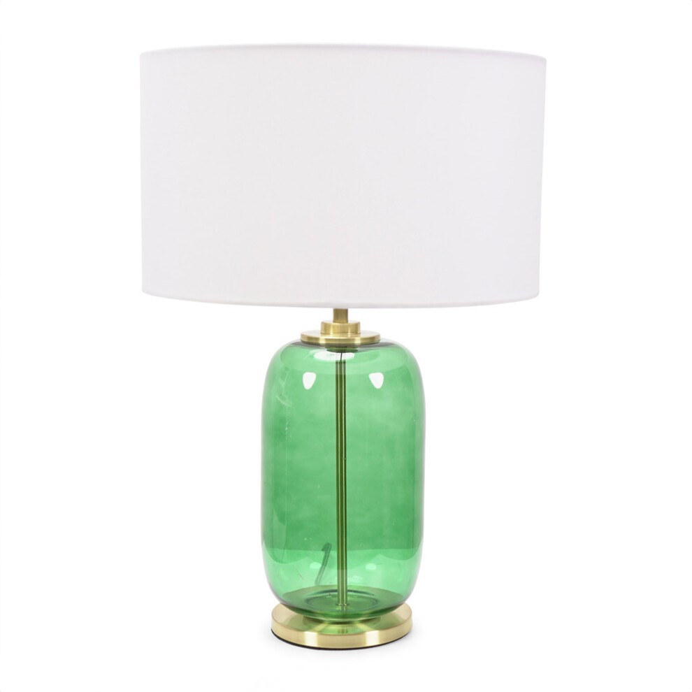 Forest green glass table lamp with a gold trim base, featuring a white fabric drum shade and an LED bulb, showcasing a modern and elegant design.