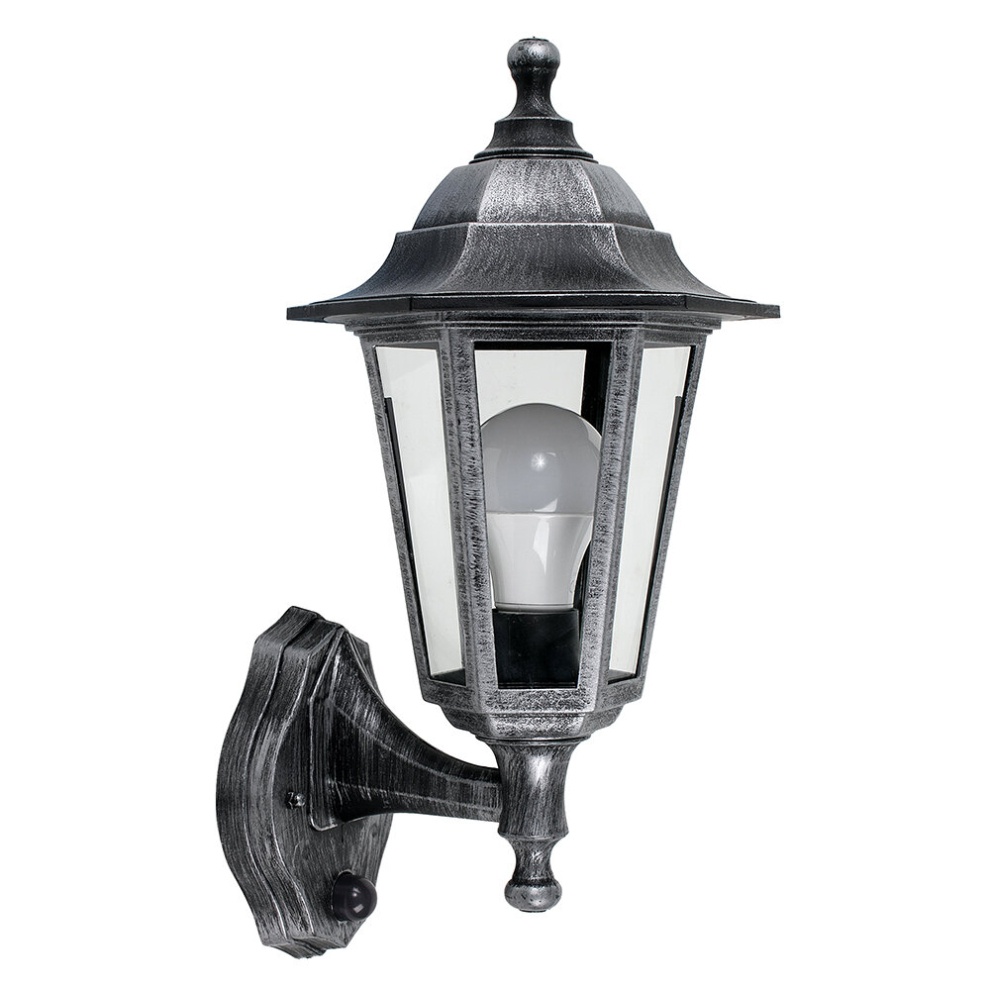 Victorian-style wall light lantern in brushed silver and black, featuring glass panels, a decorative top, and a PIR motion detector, designed for outdoor use with a 15w LED bulb.