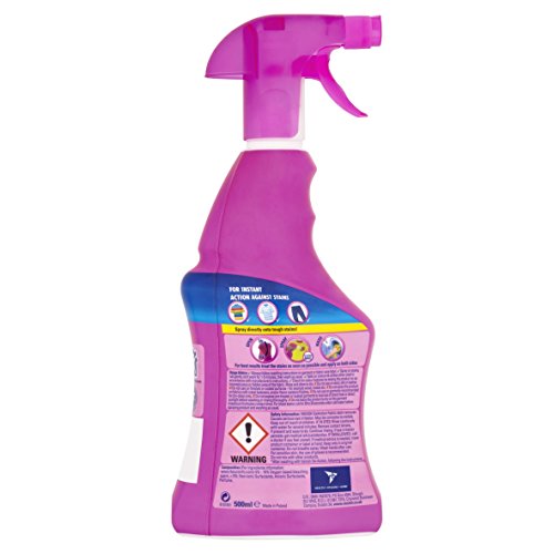 Purple spray bottle with a trigger nozzle, labeled "Vanish Oxi Action Fabric Stain Remover Pre-Wash Spray 500ml," featuring warning symbols and usage instructions on the back.