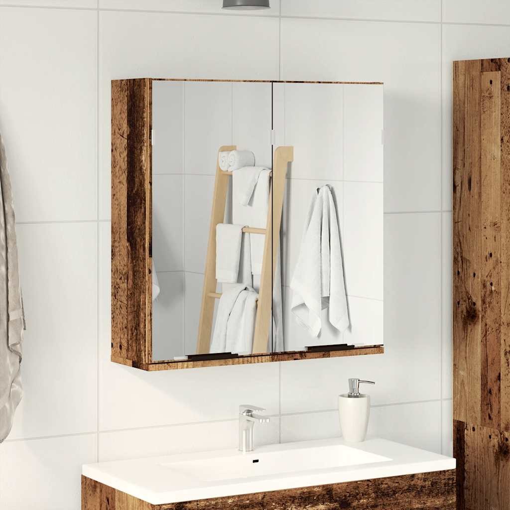 Wooden bathroom mirror cabinet with a rustic old wood finish, featuring two mirrored doors, a sleek white sink below, and a towel ladder in the background.