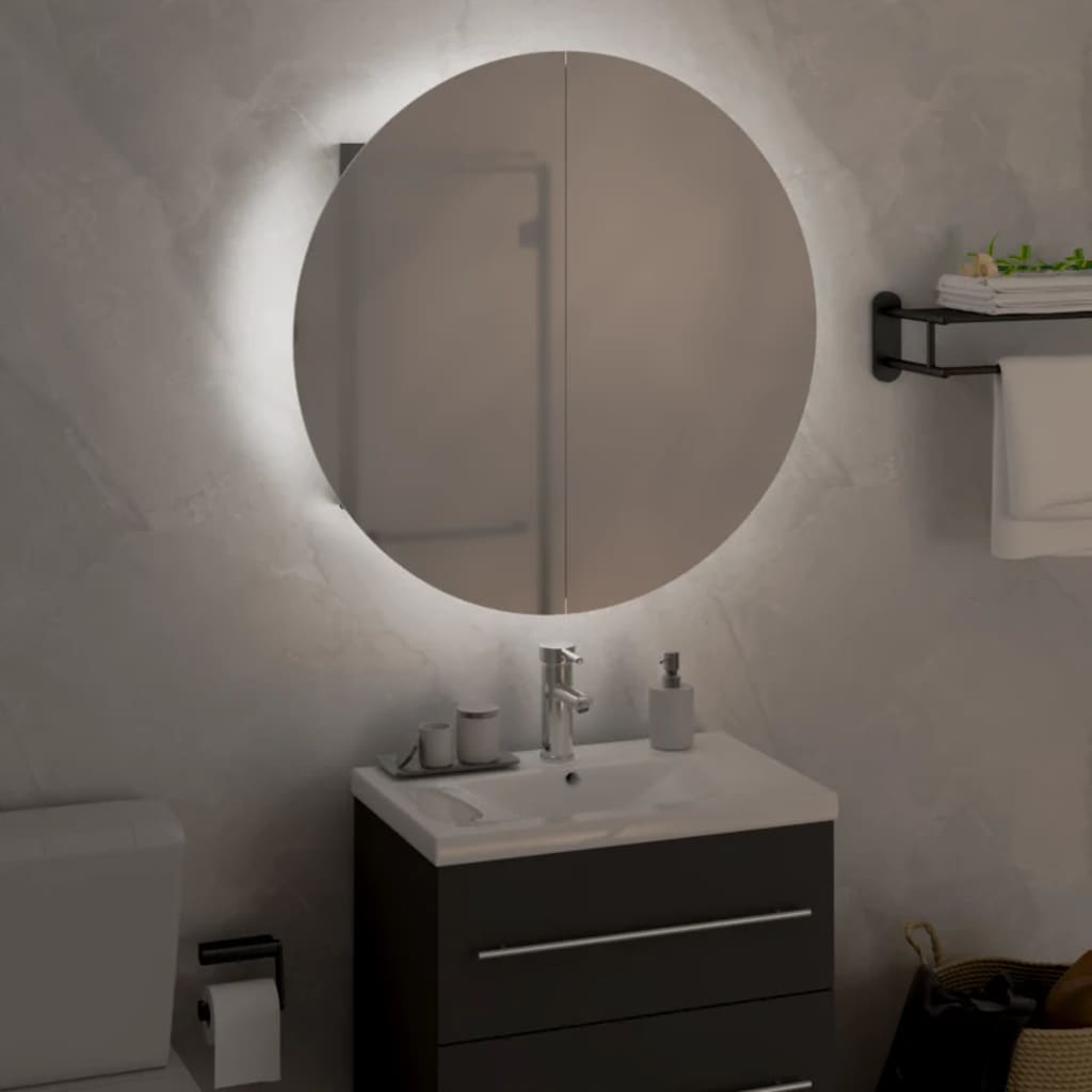 Grey engineered wood bathroom cabinet with a sleek design, featuring a white countertop, modern faucet, and a round mirror with backlighting.
