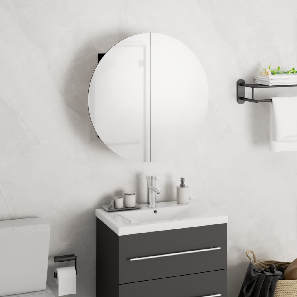 Black engineered wood bathroom cabinet with a sleek design, featuring a circular mirror, glass shelves, and a modern faucet, ideal for compact spaces.