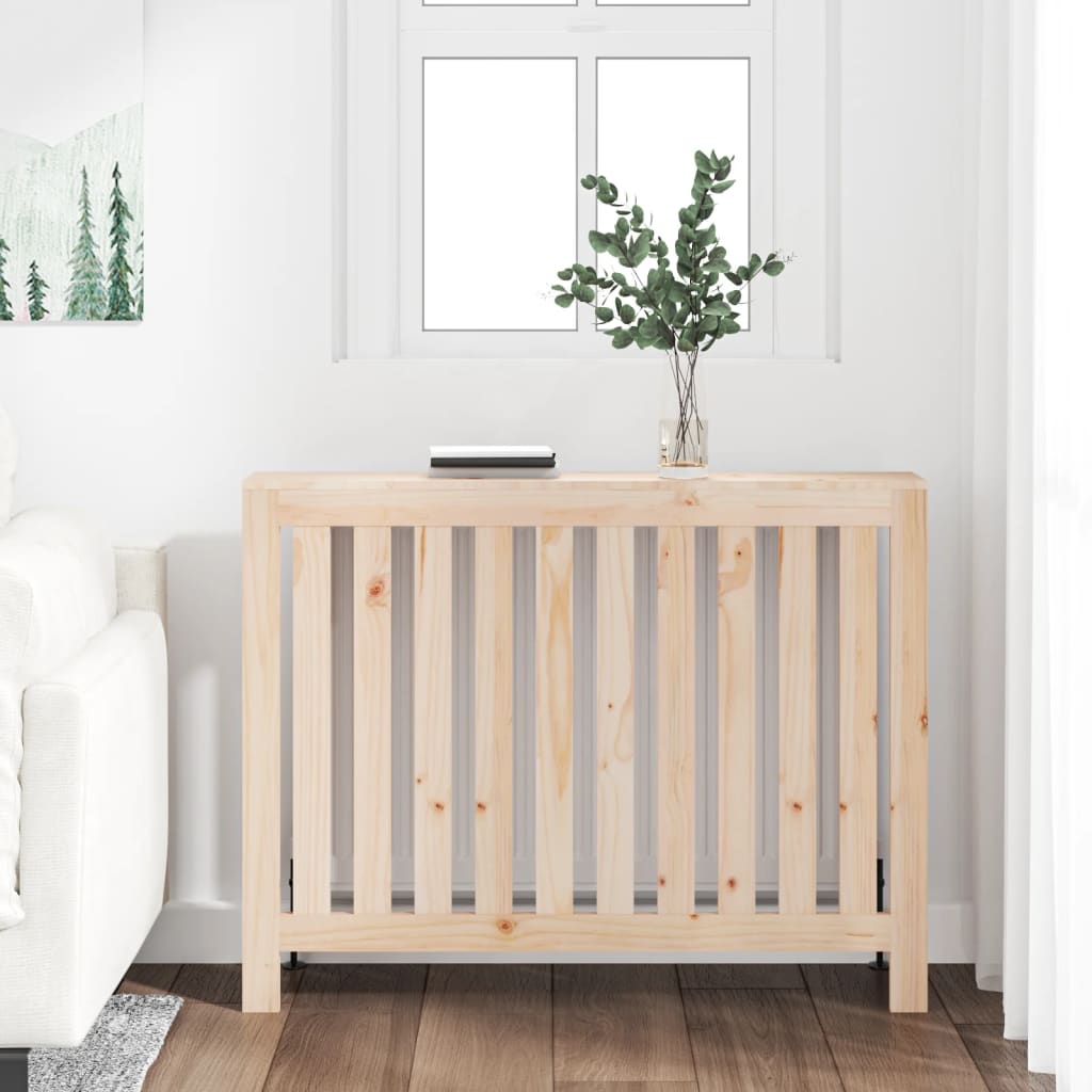 Solid wood pine radiator cover in natural finish, measuring 42.7"x7.5"x33.1", featuring vertical slats and a minimalist design, placed near a window with greenery.