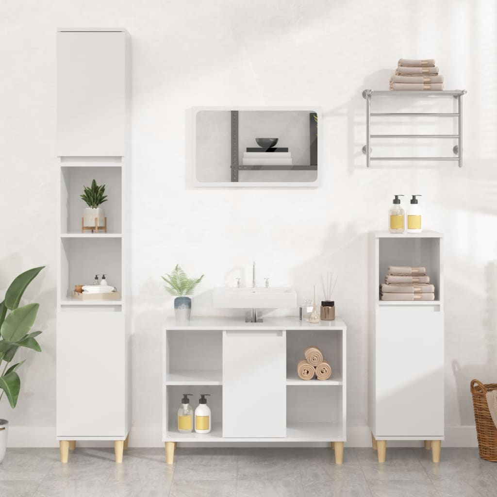 High gloss white sink cabinet made of engineered wood, featuring a central sink, open shelving, and two side cabinets with wooden legs, complemented by decorative plants and towels.