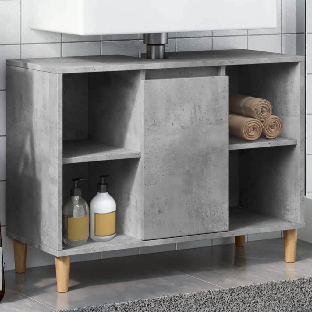 Concrete grey bathroom cabinet made of engineered wood, featuring open shelves, a central cabinet door, and wooden legs, ideal for stylish storage.