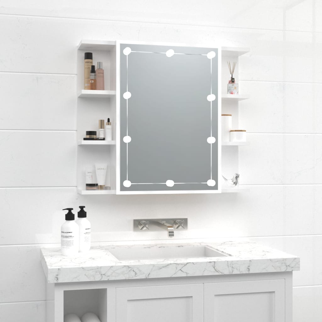 High gloss white mirror cabinet with LED lights, featuring a central mirror and side shelves for storage, measuring 70x16.5x60 cm, set above a marble countertop.