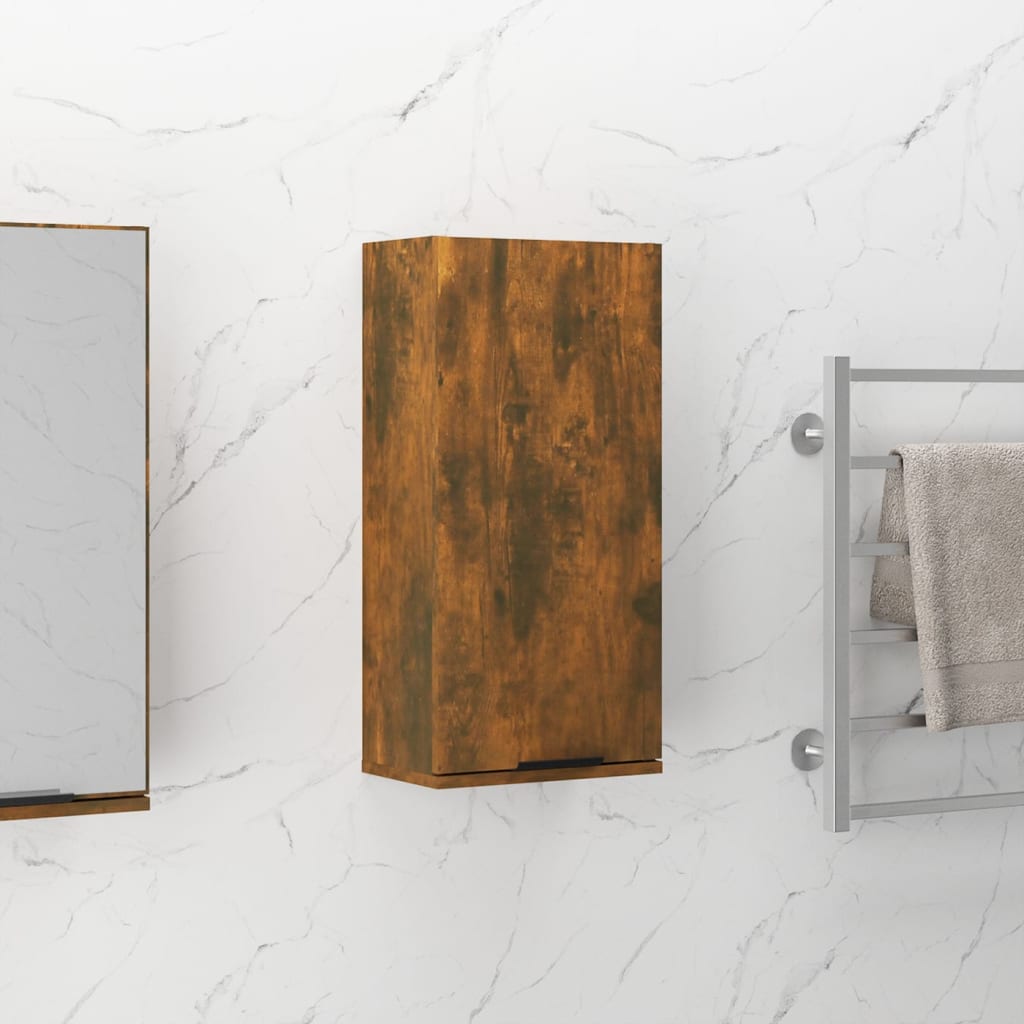 Smoked oak bathroom cabinet made of engineered wood, featuring a sleek design with a minimalist handle, mounted on a marble-patterned wall.