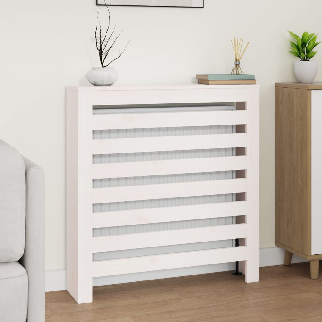 White radiator cover made of solid pine wood, featuring a slatted design and measuring 31.3x7.5x33.1 inches, placed in a modern interior setting.