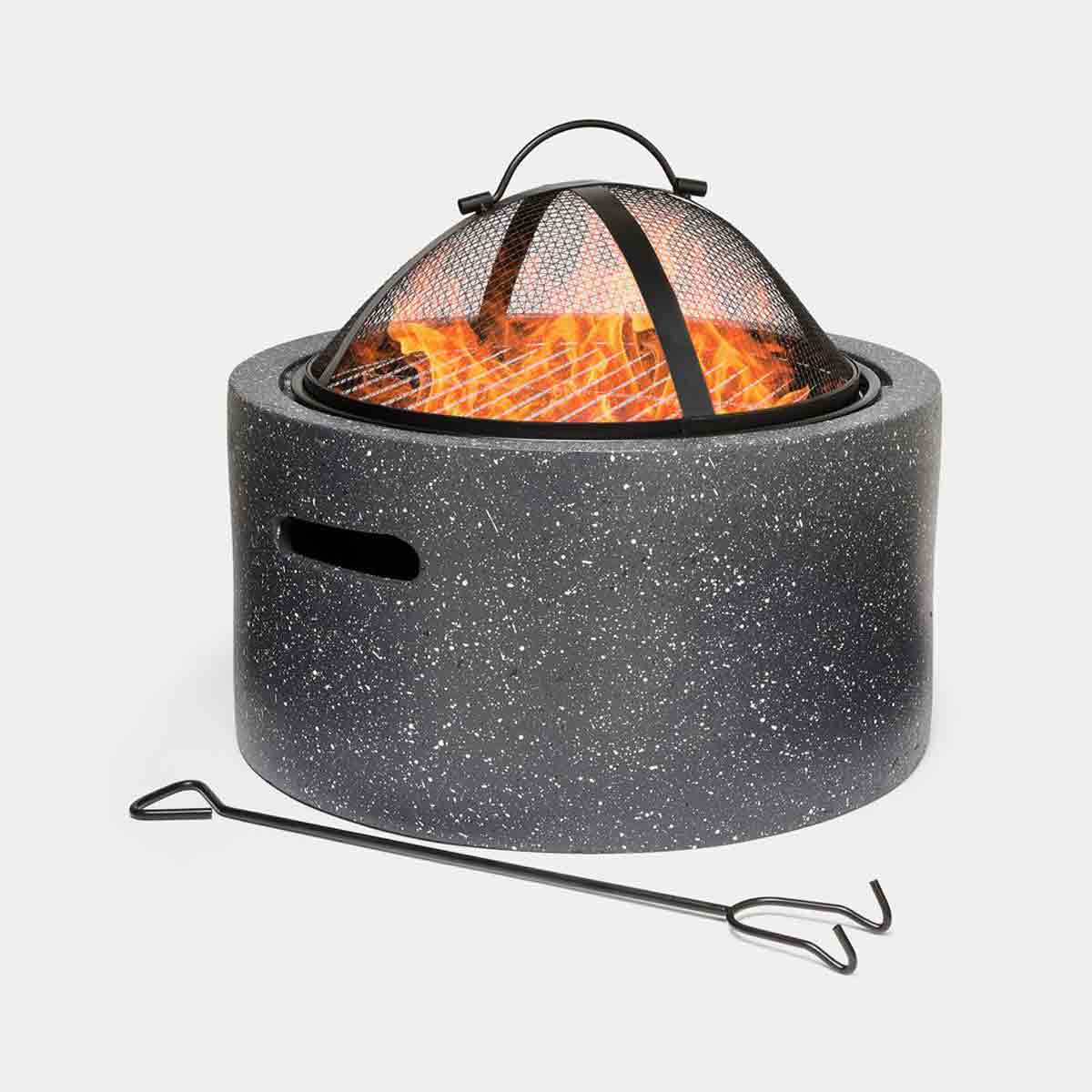 Grey 2-in-1 fire pit with a round stone-like base, mesh spark guard, and a BBQ cooking grill, accompanied by a metal poker for safety.