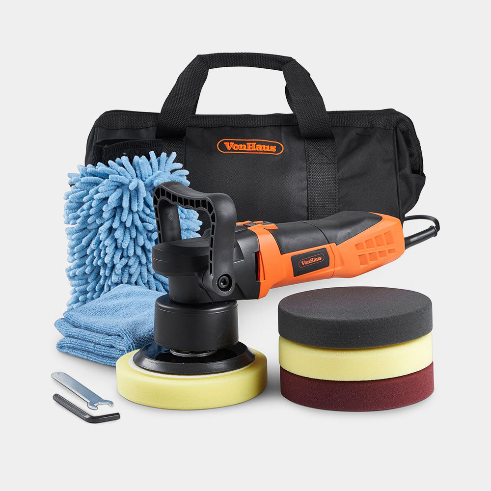 Dual Action Polisher Kit 650W by Vonhaus features a black and orange polisher, three polishing pads in yellow, white, and red, a microfiber cloth, and a carrying bag.
