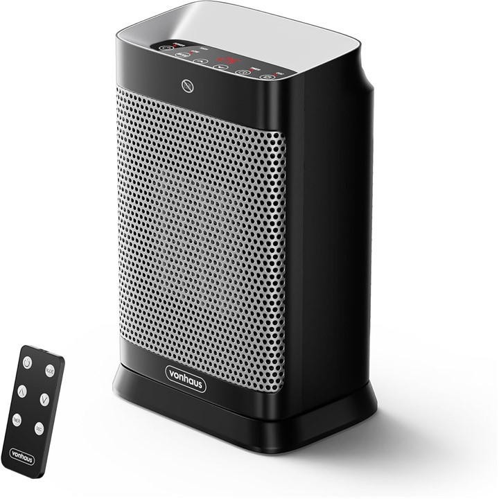 Black PTC space heater by VonHaus with a sleek design, metallic mesh front, control panel on top, and a remote control for convenience.