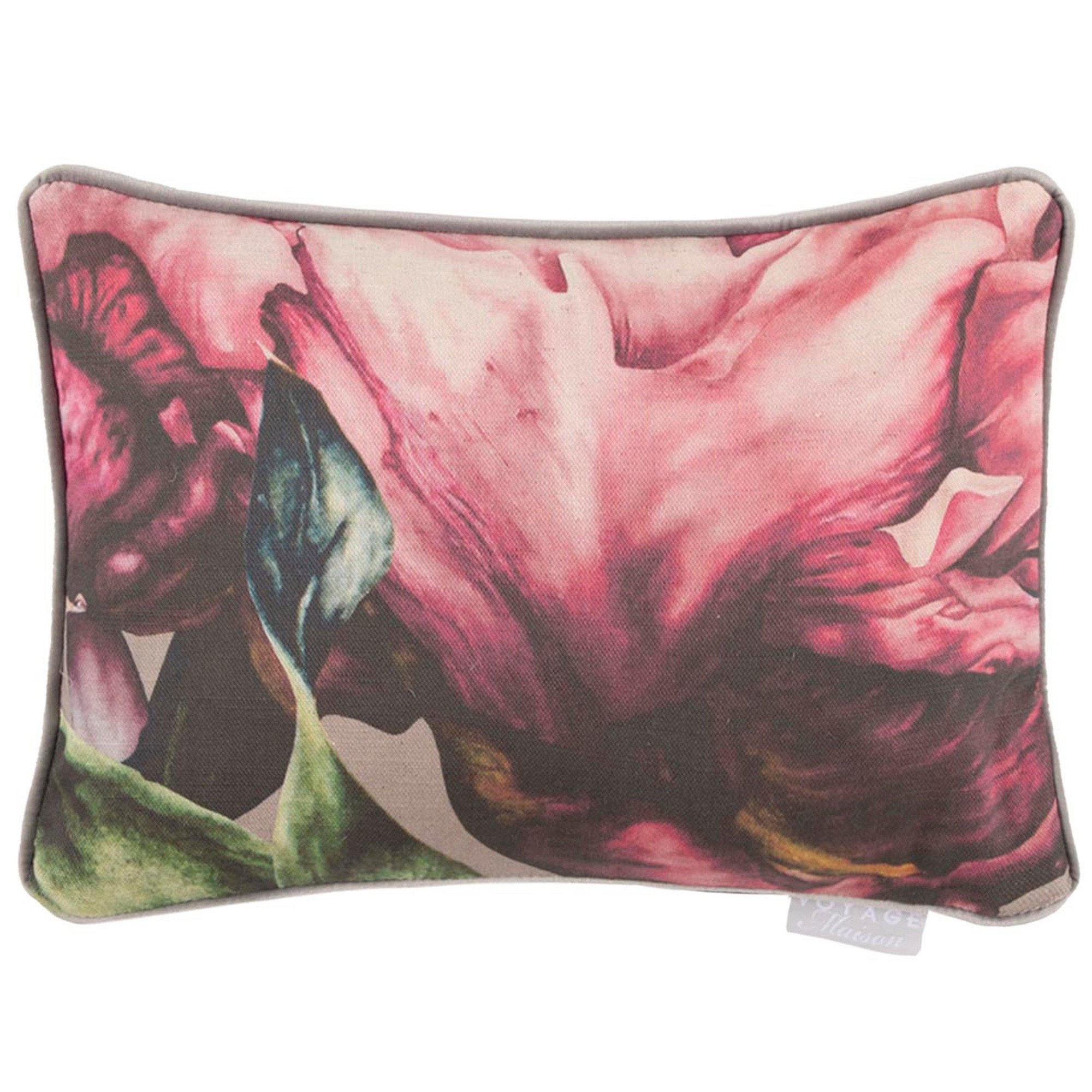 Rectangular cushion featuring a vibrant floral design in shades of pink and green, with a piped edge and soft fabric texture, ideal for adding a pop of color to any decor.