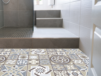 Self-adhesive brown floor sticker featuring a melange of intricate Spanish tile patterns, designed for kitchens, bathrooms, and living rooms, measuring 120cm x 60cm.