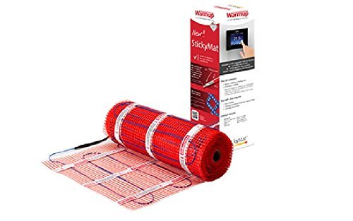 Red underfloor heating mat rolled up, featuring a textured surface and wires, with a product box in the background displaying the brand name "Warmup" and key features.