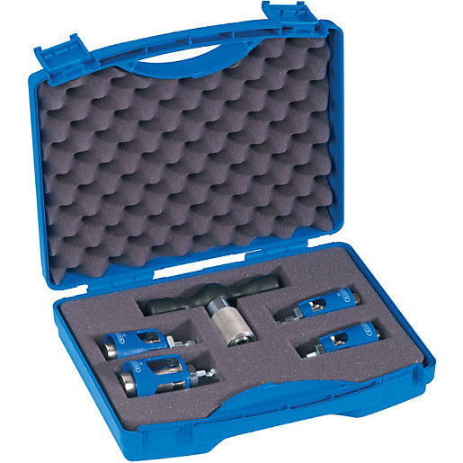 Wavin K1 Calibration Set in a blue plastic case, featuring four calibration tools with metal and plastic components, securely held in gray foam padding.