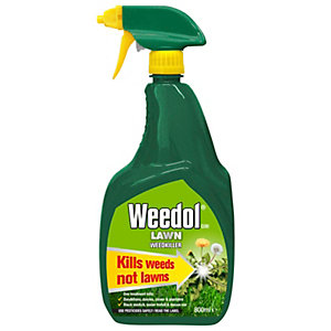 Green plastic spray bottle with a yellow trigger, labeled "Weedol Lawn Weedkiller" in bold text, featuring a bright green background and the phrase "Kills weeds not lawns."