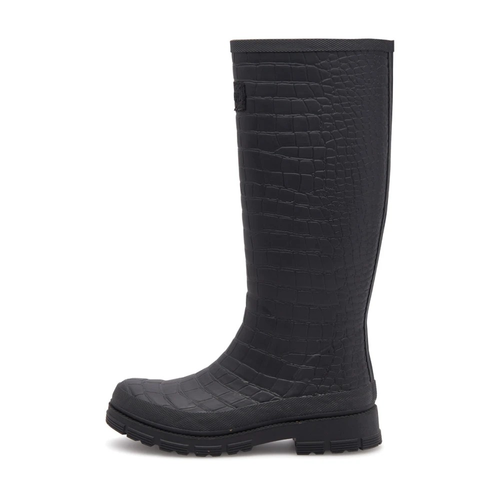 Black women's rain boots by Woden, featuring a textured crocodile pattern, tall shaft, and sturdy rubber sole for durability and grip.