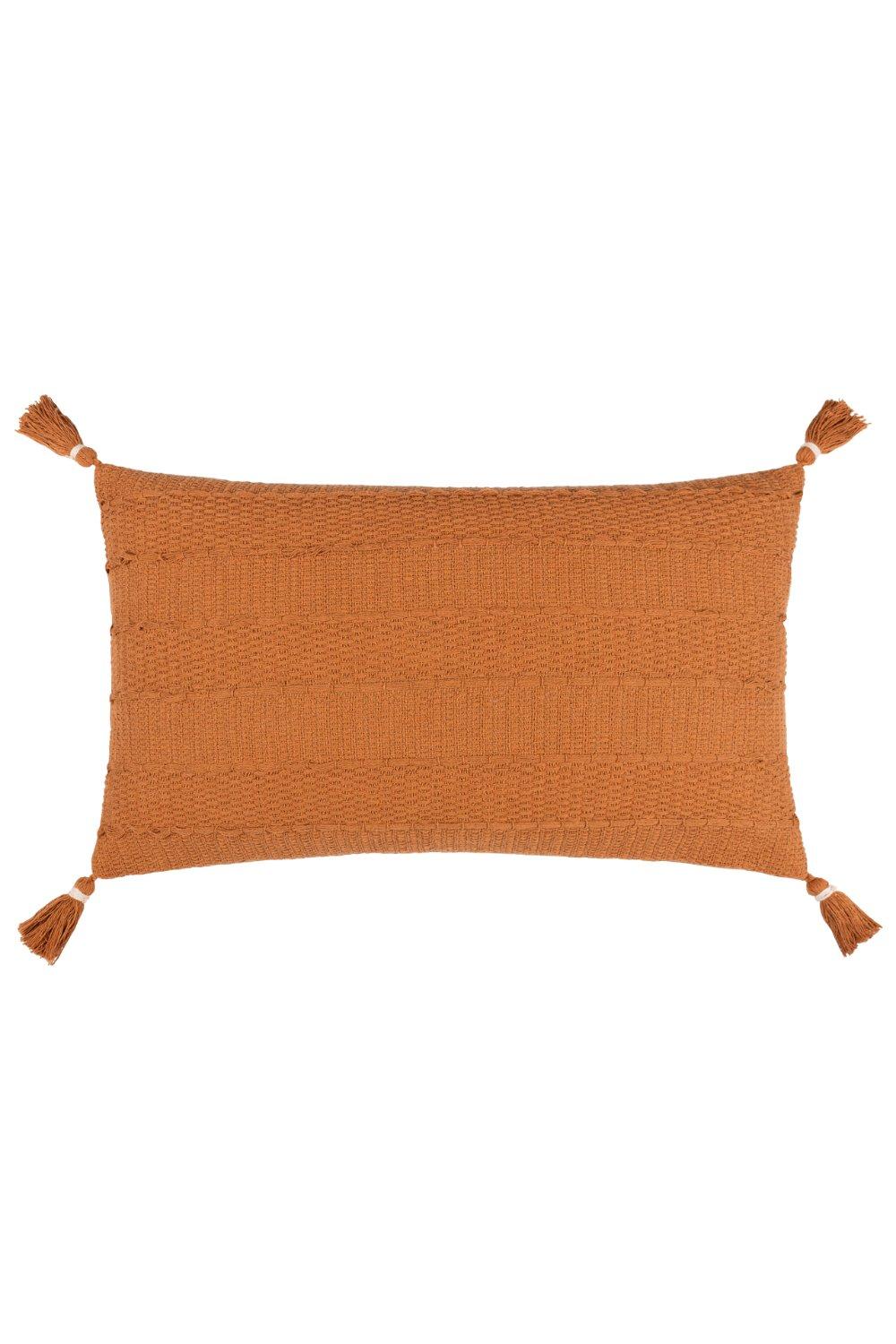 Textured ginger cotton cushion with tassels at each corner, featuring a woven pattern and a rectangular shape, perfect for adding warmth to any space.