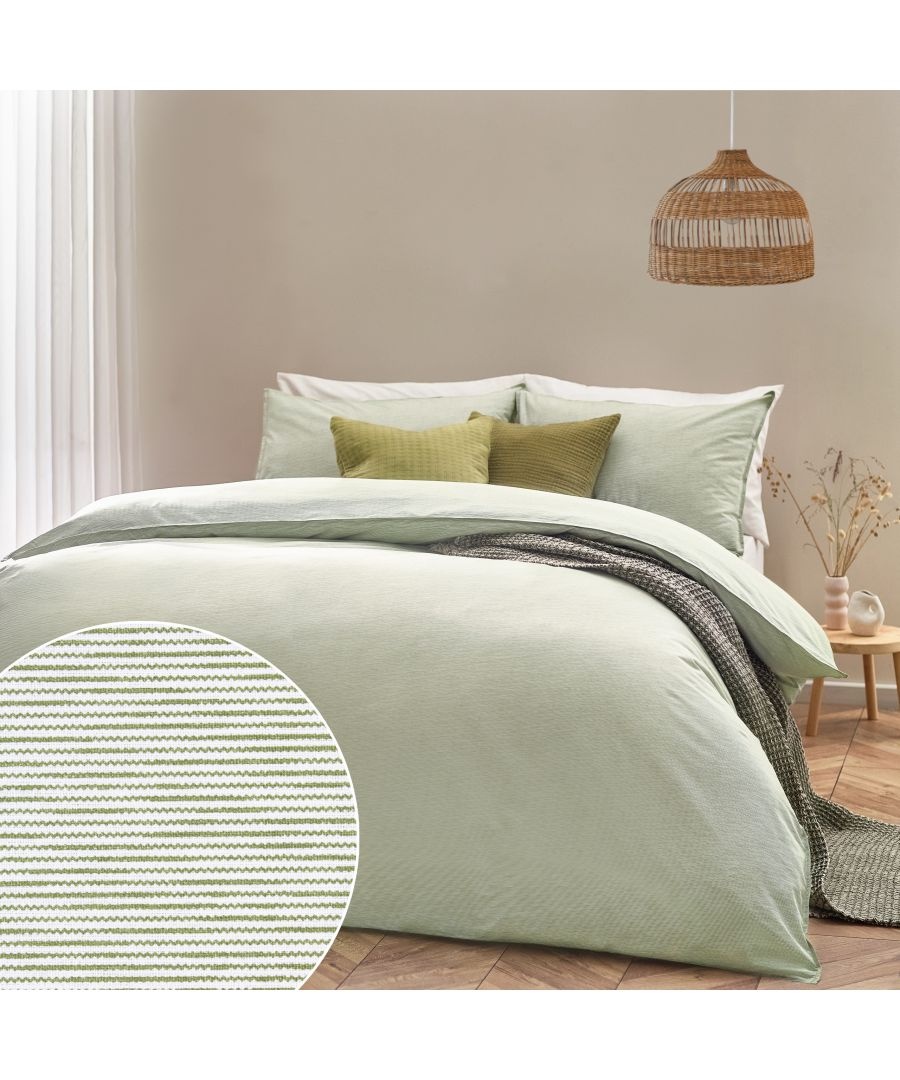 Khaki striped duvet cover set in 100% cotton, featuring a super king size with matching pillowcases, complemented by green accent cushions and a woven pendant light.