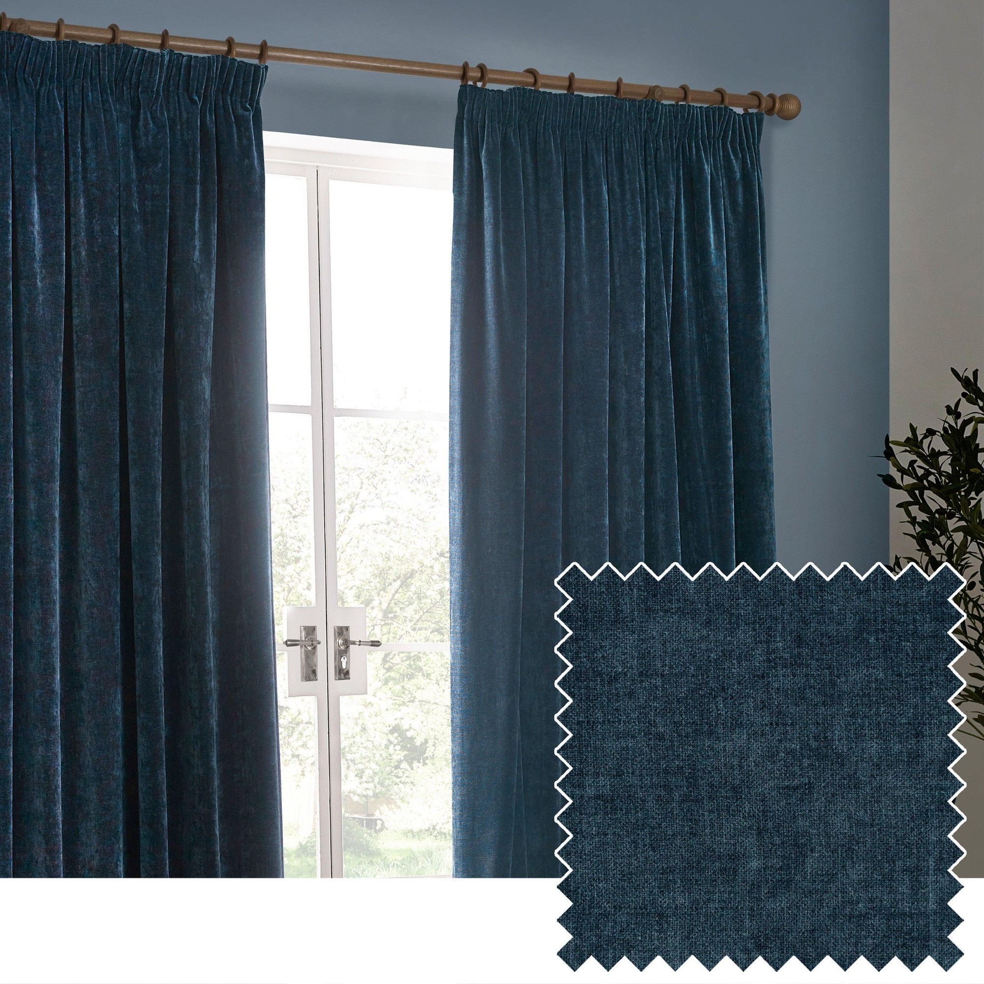 Heavy chenille velvet curtains in a deep teal color with pencil pleat design, offering room darkening features, displayed alongside a fabric swatch for texture reference.