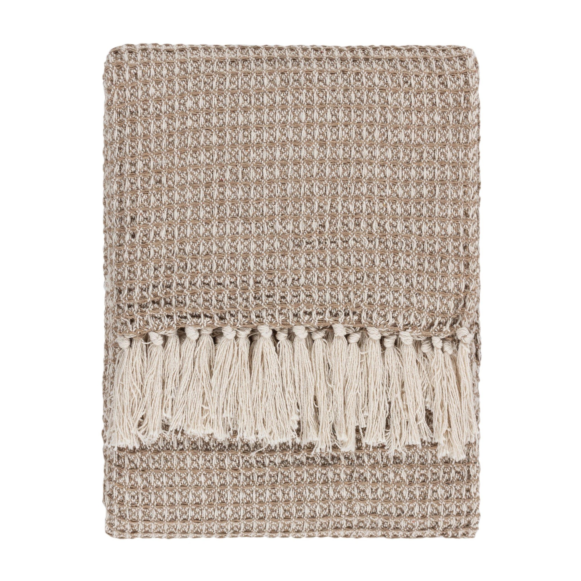 Beige cotton throw blanket featuring a textured waffle pattern and decorative fringes, measuring 150 cm x 200 cm, perfect for adding warmth and style to any space.