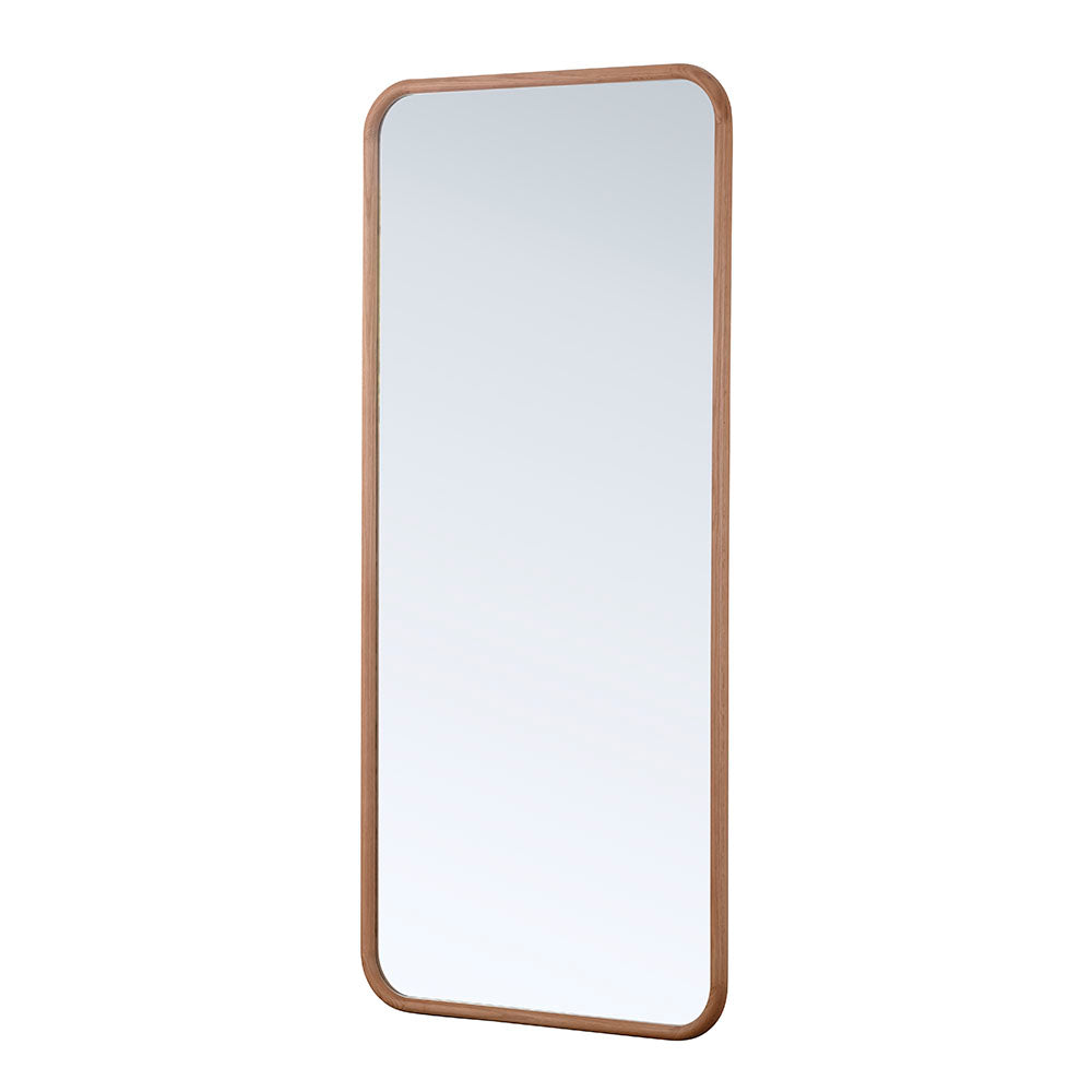 Curved wall mirror with a natural oak frame, measuring 90x60cm, featuring a sleek, minimalist design and a reflective surface.
