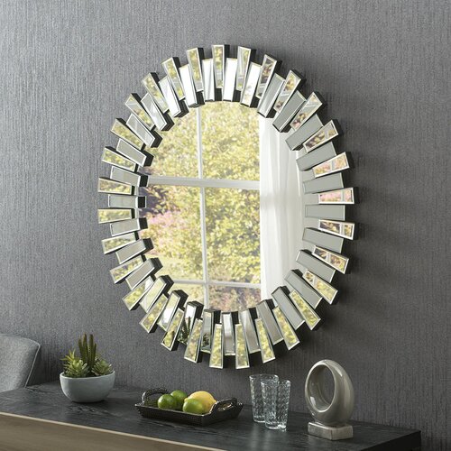 Arched Victorian-style mirror in gold, measuring 127cm wide by 89cm high, featuring an ornate frame with intricate detailing and a reflective surface.
