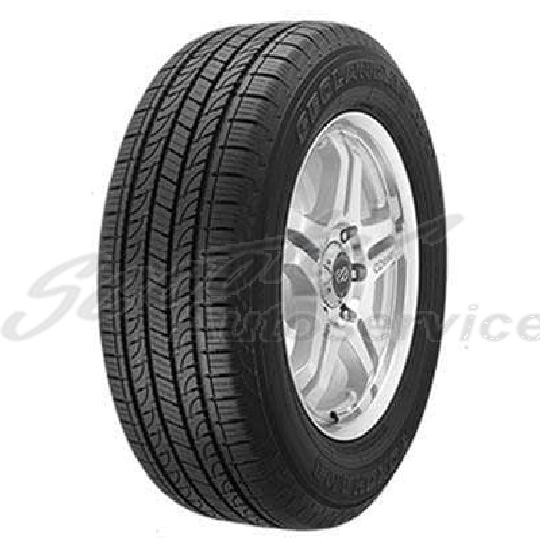 Yokohama Geolandar H/T (G056) tire in size 275/65 R17, featuring a black rubber tread with a symmetrical pattern, mounted on a silver alloy wheel.