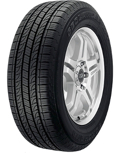 Yokohama Geolandar H/T (G056) tire in size 275/50 R21 113V XL, featuring a black rubber surface with a tread pattern designed for all-terrain performance and a silver alloy wheel.