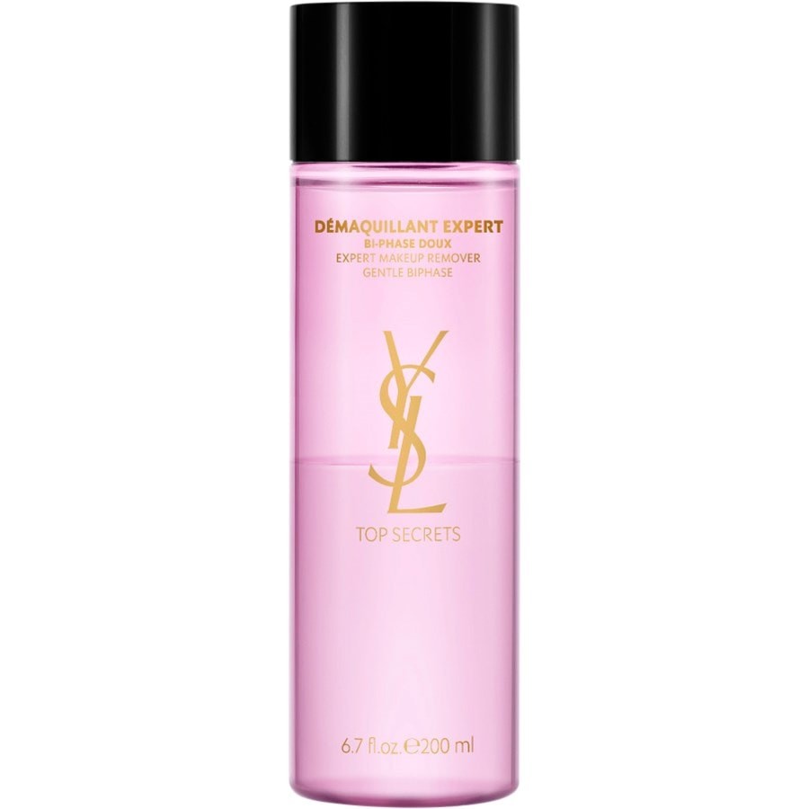 Clear bi-phase makeup remover in a transparent pink bottle, featuring a gold YSL logo and "Top Secrets" label, with a capacity of 200ml.