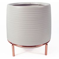 White ceramic planter with subtle ridges, 18cm diameter, on a sleek copper metal stand.