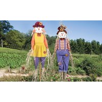Two 6ft scarecrows with straw hats, plaid shirts, and colorful overalls in a garden setting.