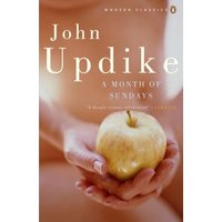 Book cover of "A Month of Sundays" by John Updike, featuring a hand holding a golden apple against a blurred background.