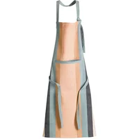 Striped Winkler Yuna apron with pocket, featuring pastel peach and gray vertical stripes and adjustable neck strap.