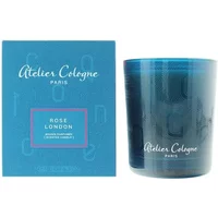 Atelier Cologne Rose London Candle, 180g, in a blue glass holder with matching blue box featuring white text.