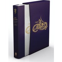 Purple hardcover book "Beowulf" with gold dragon design, slipcase, and silver spine detailing.