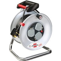 Brennenstuhl 25m cable reel, silver with black handle, three grey sockets, and red accents on a metal stand.