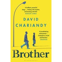 Yellow book cover of "Brother" by David Chariandy, featuring silhouettes of two walking figures under a streetlamp.