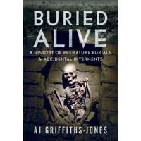 "Book titled 'Buried Alive' featuring a skeleton in a stone tomb on the cover."