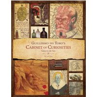 "Guillermo del Toro's Cabinet of Curiosities book with illustrated cover featuring art and sketches."