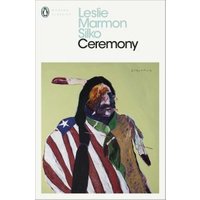 Book cover of "Ceremony" by Leslie Marmon Silko, featuring abstract Native American figure with a U.S. flag draped over shoulder.