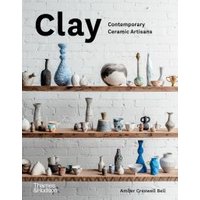 "Clay book with ceramic vases and sculptures on wooden shelves against a white brick wall"