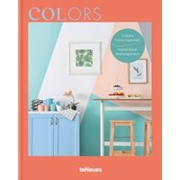 "Colors book with coral border, featuring pastel kitchen scene with blue cabinet, wooden stool, and framed art."