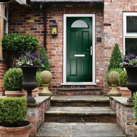 Dark green composite door with four square sunburst design, left-hand handle, obscure glass, and 150 cill included.