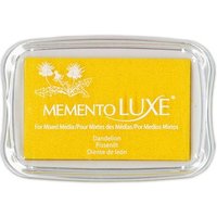 Yellow Tsukineko Memento Luxe ink pad with clear plastic lid, featuring white dandelion design and text.