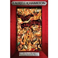 "Danse Macabre" book by Laurell K. Hamilton, red cover with abstract art and gothic font.